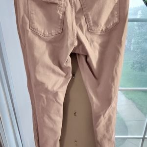 Faded pink high rise ripped skinny jeans